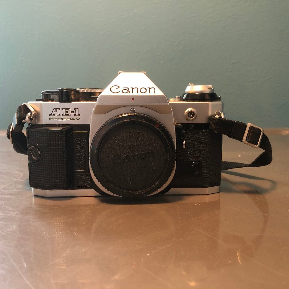 Canon AE-1 Program 35 mm Camera w/Lenses, Bounce Flash, and Camera Bag